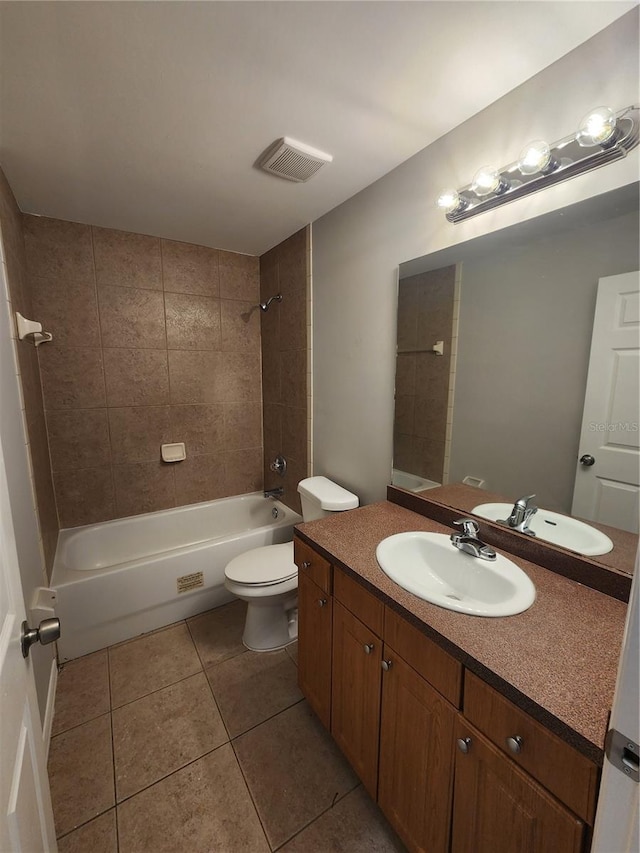 3407 E Comanche Ave, Tampa, FL 33610 - full bathroom with tile patterned floors, vanity, and washtub / shower combination