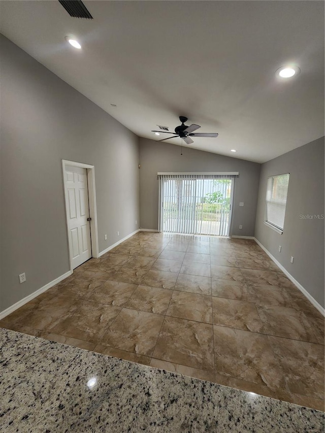 3407 E Comanche Ave, Tampa, FL 33610 - empty room with vaulted ceiling, a ceiling fan, and recessed lighting