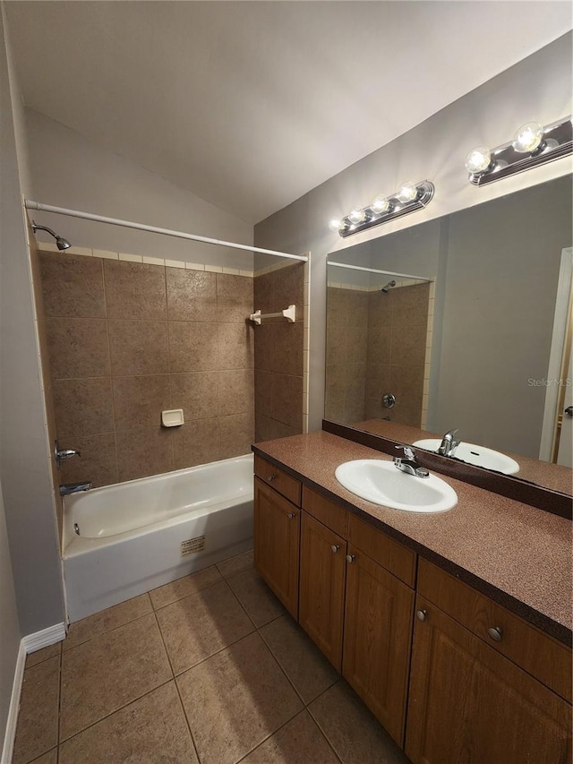 3407 E Comanche Ave, Tampa, FL 33610 - bathroom with tile patterned flooring, bathtub / shower combination, vanity, and lofted ceiling