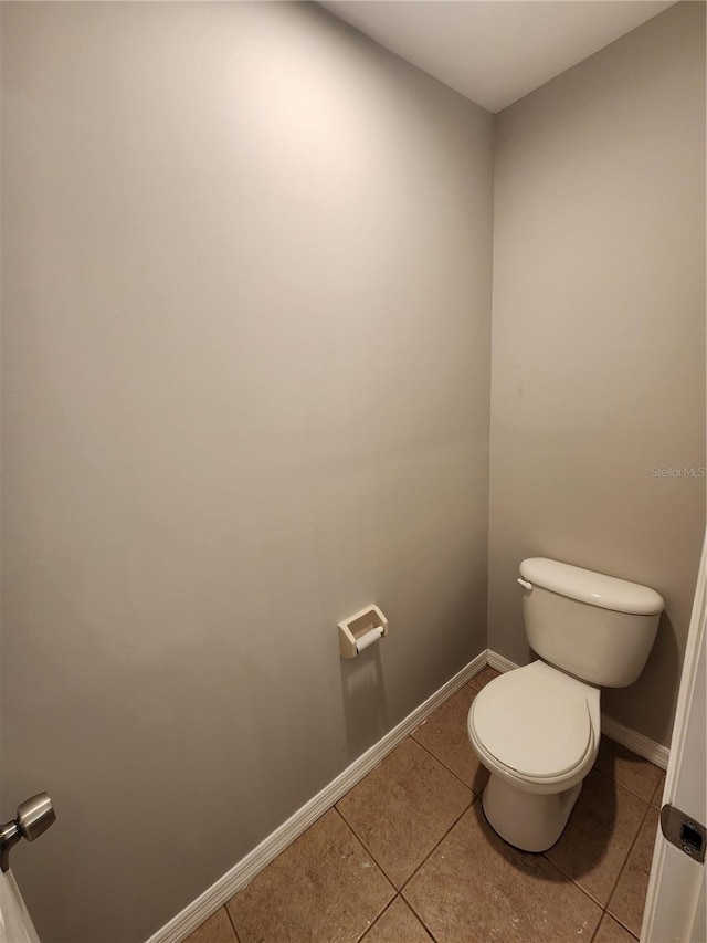 3407 E Comanche Ave, Tampa, FL 33610 - bathroom featuring tile patterned flooring and toilet