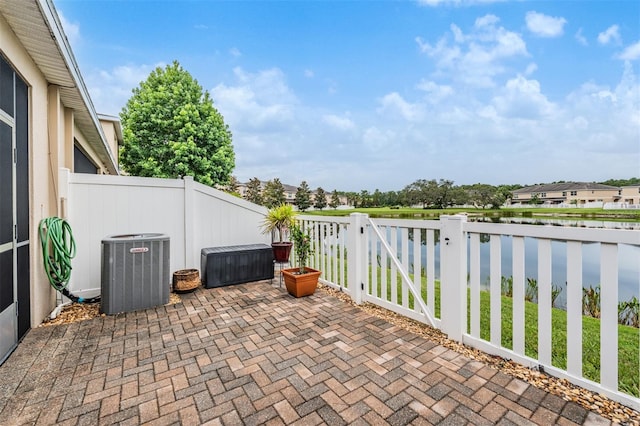 12039 Greengate Dr, Hudson, FL 34669 - view of patio / terrace featuring a water view