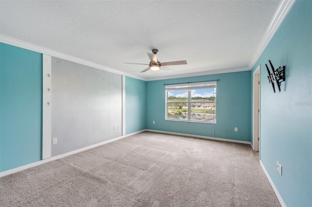 12039 Greengate Dr, Hudson, FL 34669 - carpeted empty room with ornamental molding, a ceiling fan, and a textured ceiling