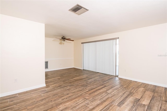 3406 Rock Royal Dr, Holiday, FL 34691 - empty room featuring wood finished floors and a ceiling fan