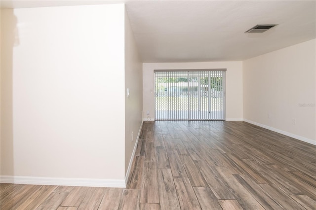 3406 Rock Royal Dr, Holiday, FL 34691 - empty room with wood finished floors