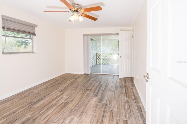 3406 Rock Royal Dr, Holiday, FL 34691 - spare room featuring wood finished floors and a ceiling fan