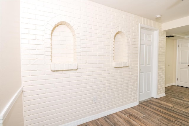 3406 Rock Royal Dr, Holiday, FL 34691 - detailed view of wood finished floors and a smoke detector