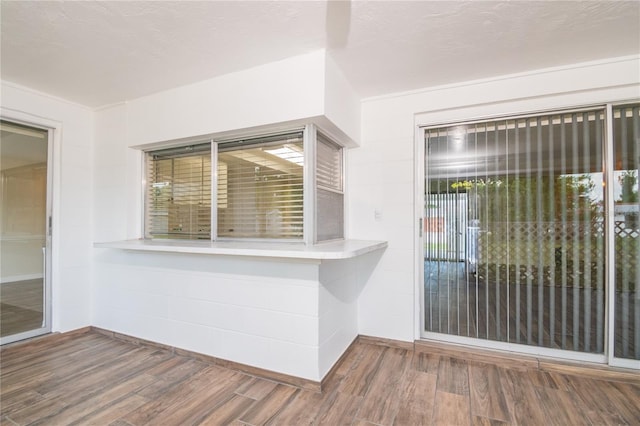 3406 Rock Royal Dr, Holiday, FL 34691 - foyer with wood finished floors and baseboards