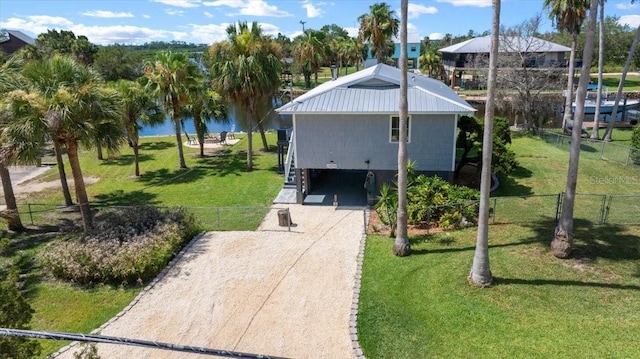 12046 W Gulf Breeze Ct, Crystal River, FL 34429 - view of front of property with a water view, driveway, and stairway