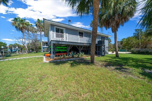 12046 W Gulf Breeze Ct, Crystal River, FL 34429 - rear view of house featuring stairway and a wooden deck