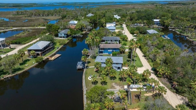 12046 W Gulf Breeze Ct, Crystal River, FL 34429 - aerial view of property's location with a nearby body of water and a heavily wooded area