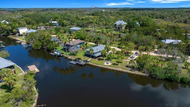 12046 W Gulf Breeze Ct, Crystal River, FL 34429 - drone / aerial view of a nearby body of water and a heavily wooded area