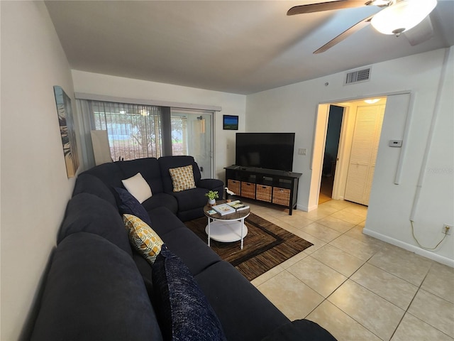 1975 W Bay Dr Unit 304, Largo, FL 33770 - living area featuring light tile patterned flooring and ceiling fan