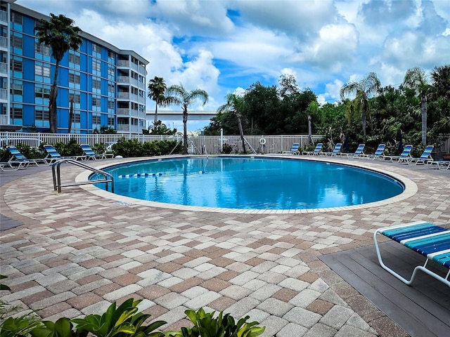 3315 58th Ave S Unit 409, Saint Petersburg, FL 33712 - community pool featuring a patio