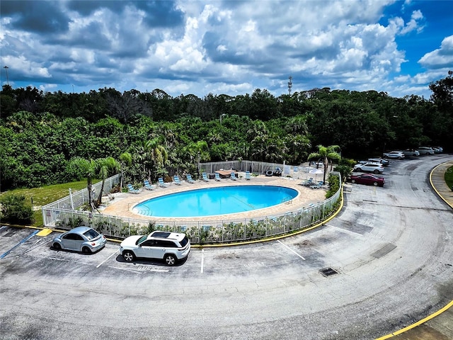 3315 58th Ave S Unit 409, Saint Petersburg, FL 33712 - community pool with a wooded view