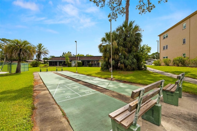 1370 Heather Ridge Blvd Unit 105, Dunedin, FL 34698 - view of property's community featuring a yard and shuffleboard