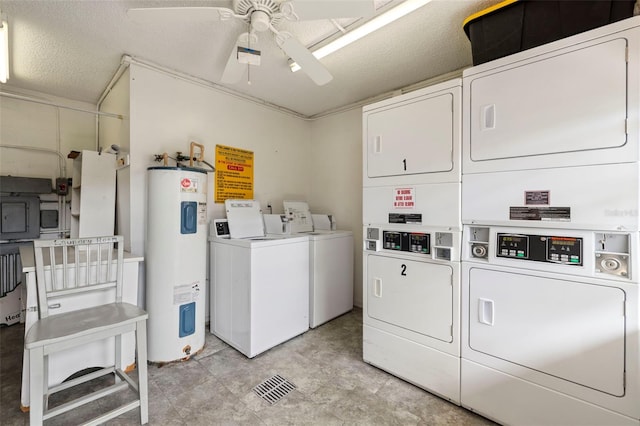 1370 Heather Ridge Blvd Unit 105, Dunedin, FL 34698 - communal laundry room featuring electric water heater, estacked washer and dryer, washer and clothes dryer, and ceiling fan