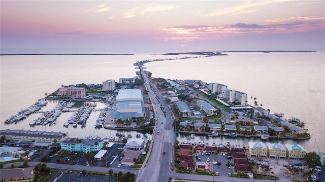 1370 Heather Ridge Blvd Unit 105, Dunedin, FL 34698 - aerial view at dusk of a water view and a view of city