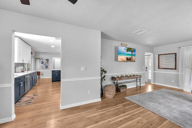 3731 Southview Dr, Brandon, FL 33511 - foyer featuring light wood-type flooring and a textured ceiling