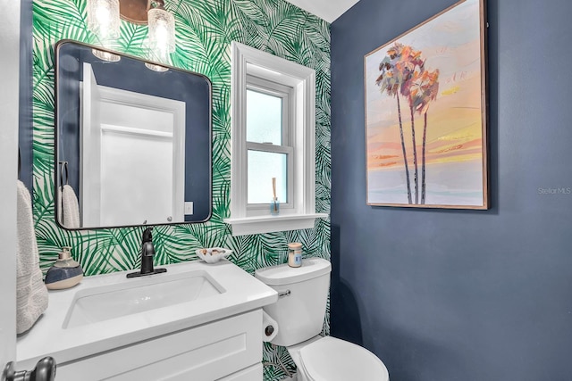 3731 Southview Dr, Brandon, FL 33511 - bathroom featuring wallpapered walls and vanity