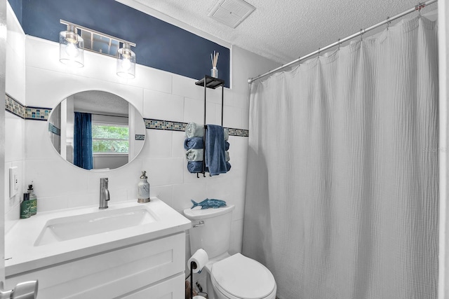 3731 Southview Dr, Brandon, FL 33511 - full bathroom featuring tile walls, a textured ceiling, vanity, backsplash, and a shower with curtain