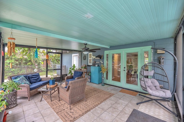 3731 Southview Dr, Brandon, FL 33511 - sunroom featuring french doors, an outdoor hangout area, and a ceiling fan