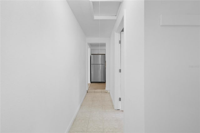 4923 Avery Rd, New Port Richey, FL 34652 - hall featuring attic access and light tile patterned floors