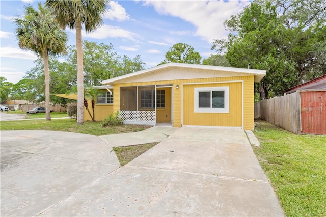 4923 Avery Rd, New Port Richey, FL 34652 - view of front of home with a sunroom