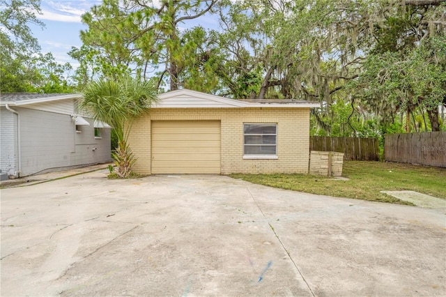 4923 Avery Rd, New Port Richey, FL 34652 - garage featuring driveway
