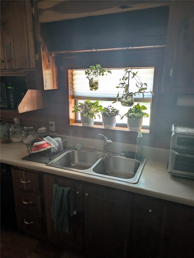 2833 SW Wilson Springs Rd, Fort White, FL 32038 - kitchen with a sink and light countertops