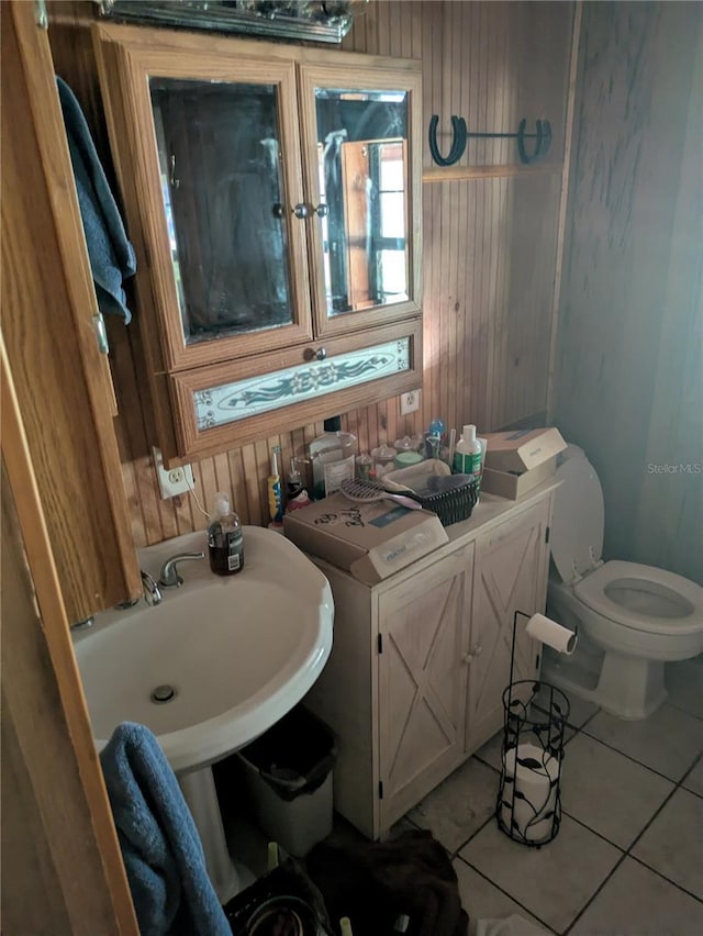 2833 SW Wilson Springs Rd, Fort White, FL 32038 - bathroom with tile patterned flooring and wooden walls