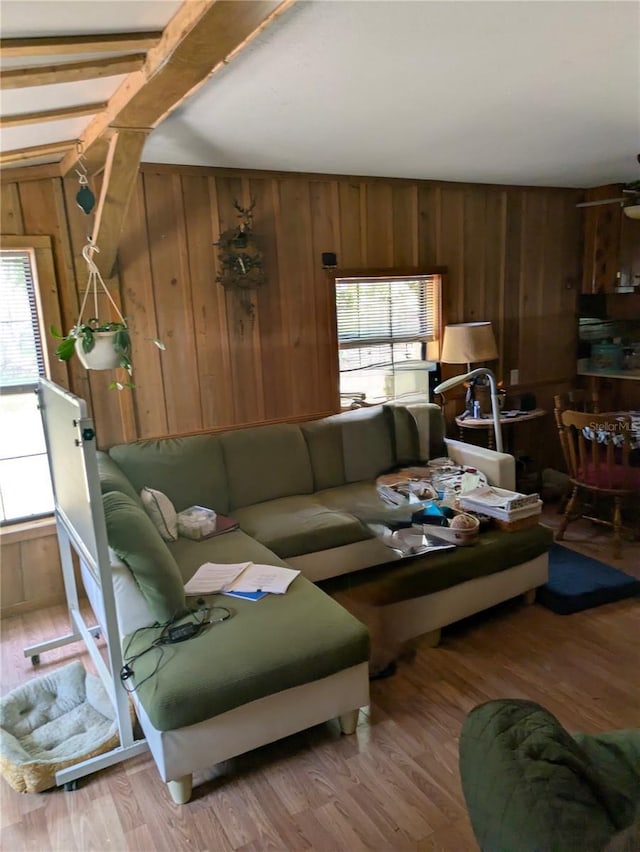 2833 SW Wilson Springs Rd, Fort White, FL 32038 - living area with healthy amount of natural light, wood walls, and light wood-style floors