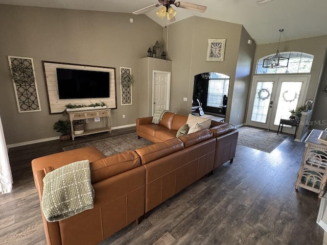 10080 SE 69th Ter, Belleview, FL 34420 - living area with high vaulted ceiling, dark wood-type flooring, a ceiling fan, french doors, and arched walkways