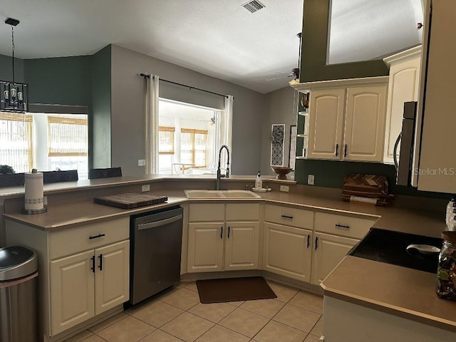 10080 SE 69th Ter, Belleview, FL 34420 - kitchen featuring stainless steel appliances, white cabinetry, light tile patterned flooring, and open shelves
