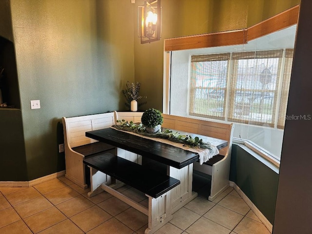 10080 SE 69th Ter, Belleview, FL 34420 - dining room featuring breakfast area and light tile patterned floors