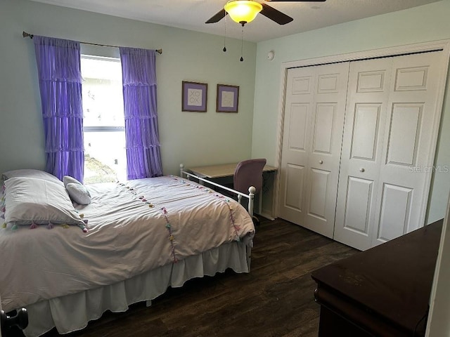 10080 SE 69th Ter, Belleview, FL 34420 - bedroom with dark wood-type flooring, a closet, and ceiling fan