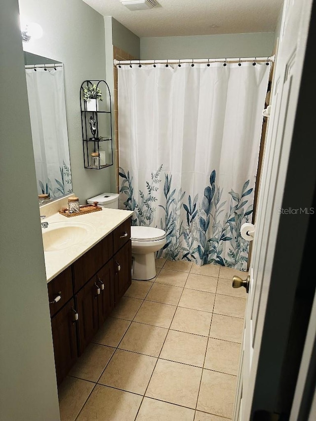 10080 SE 69th Ter, Belleview, FL 34420 - full bathroom featuring vanity and tile patterned flooring