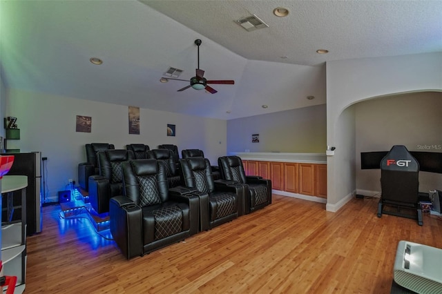 22623 Cliffside Way, Land O Lakes, FL 34639 - cinema featuring light wood finished floors, a ceiling fan, and vaulted ceiling
