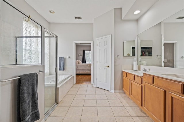 22623 Cliffside Way, Land O Lakes, FL 34639 - ensuite bathroom with a bath, double vanity, tile patterned floors, and a shower with shower door