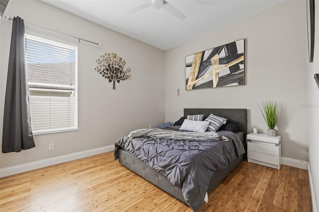 22623 Cliffside Way, Land O Lakes, FL 34639 - bedroom with wood finished floors and ceiling fan