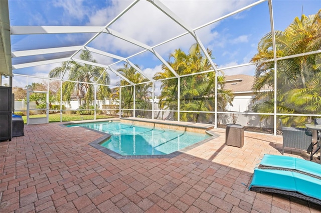22623 Cliffside Way, Land O Lakes, FL 34639 - swimming pool with a patio area and glass enclosure