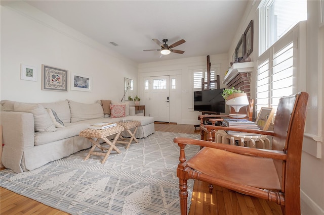 1407 S Moody Ave, Tampa, FL 33629 - living room featuring wood finished floors and a ceiling fan