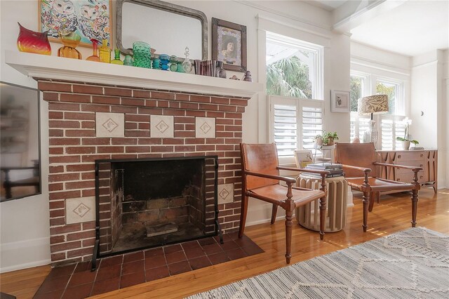 1407 S Moody Ave, Tampa, FL 33629 - detailed view of wood finished floors and a brick fireplace