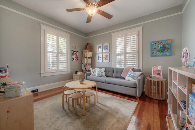 1407 S Moody Ave, Tampa, FL 33629 - living area featuring wood finished floors and a ceiling fan