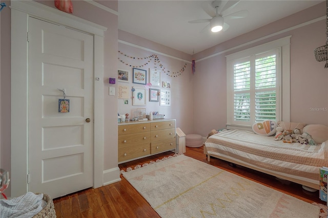 1407 S Moody Ave, Tampa, FL 33629 - bedroom featuring wood finished floors and a ceiling fan