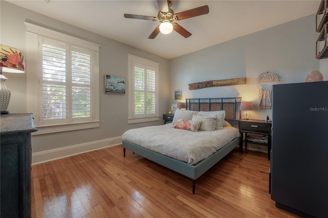 1407 S Moody Ave, Tampa, FL 33629 - bedroom featuring wood finished floors and ceiling fan