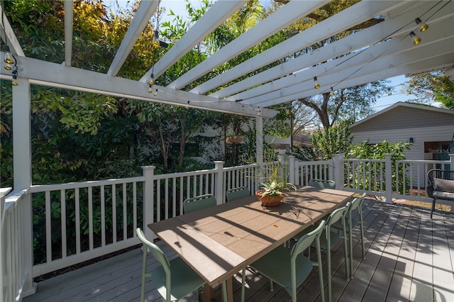 1407 S Moody Ave, Tampa, FL 33629 - wooden deck with outdoor dining area and a pergola