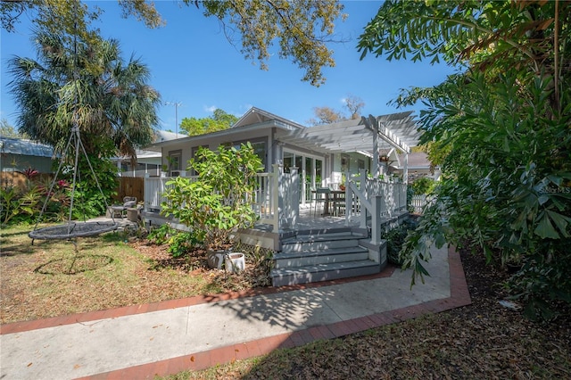 1407 S Moody Ave, Tampa, FL 33629 - view of front of property with a pergola and a deck