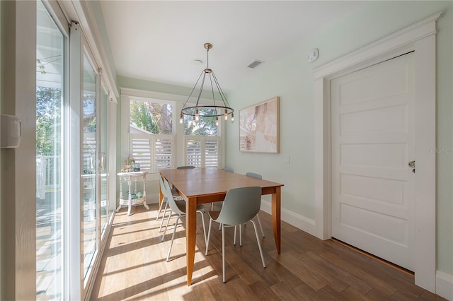 1407 S Moody Ave, Tampa, FL 33629 - dining space with wood finished floors and baseboards