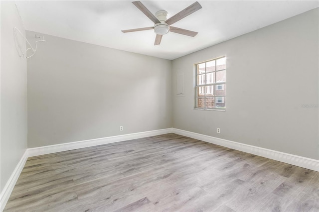 4117 Daventry Ln, Palm Harbor, FL 34685 - unfurnished room with ceiling fan and wood finished floors