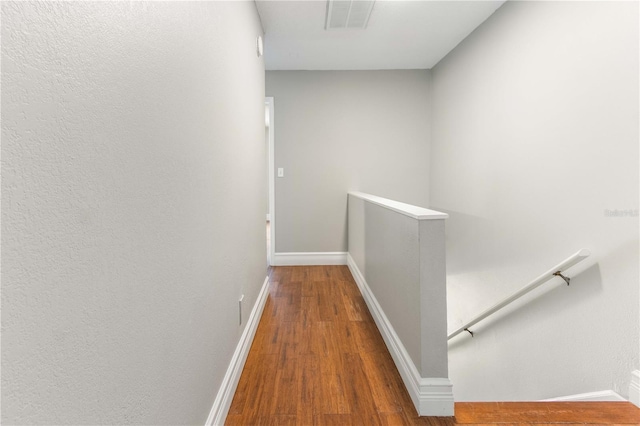 4117 Daventry Ln, Palm Harbor, FL 34685 - hall with an upstairs landing and wood finished floors